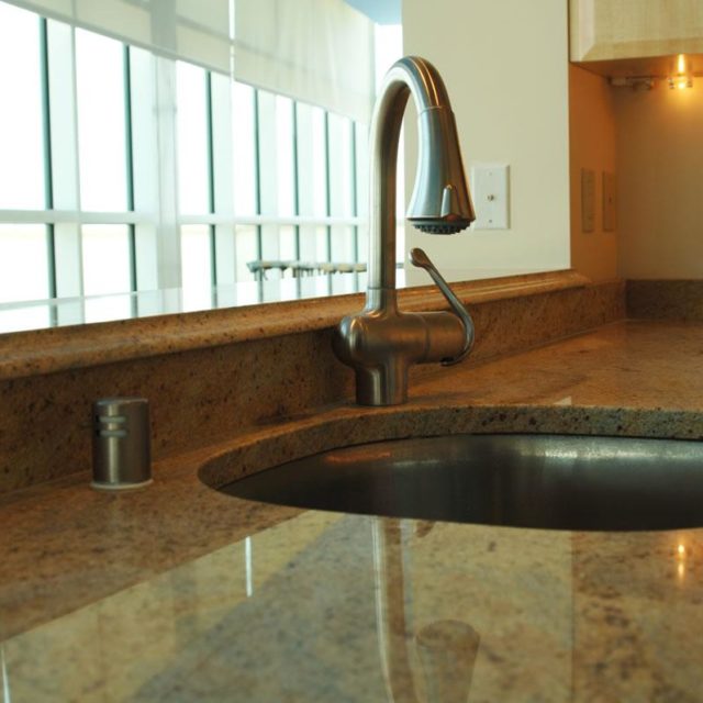 Custom granite counters in kitchen