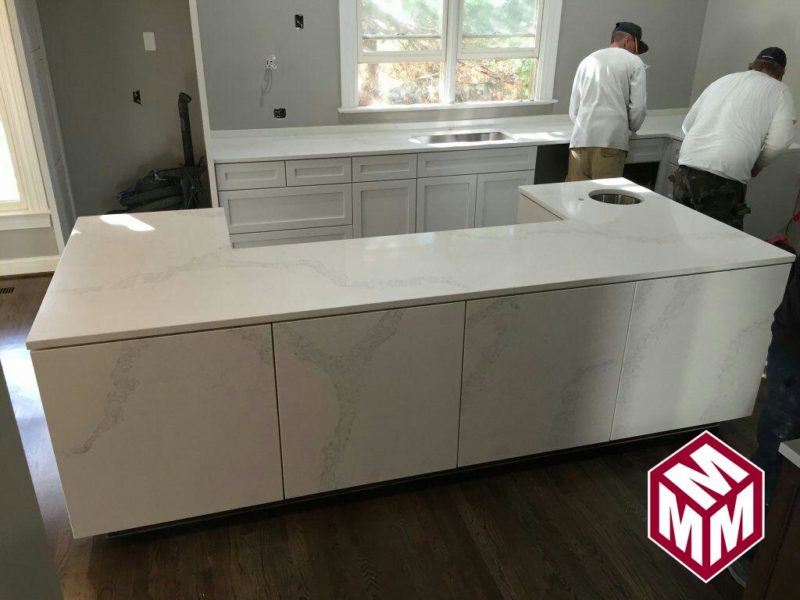 CAESARSTONE QUARTZ "CALCUTTA NUVO" ISLAND WITH SIDE WATERFALL PANELS